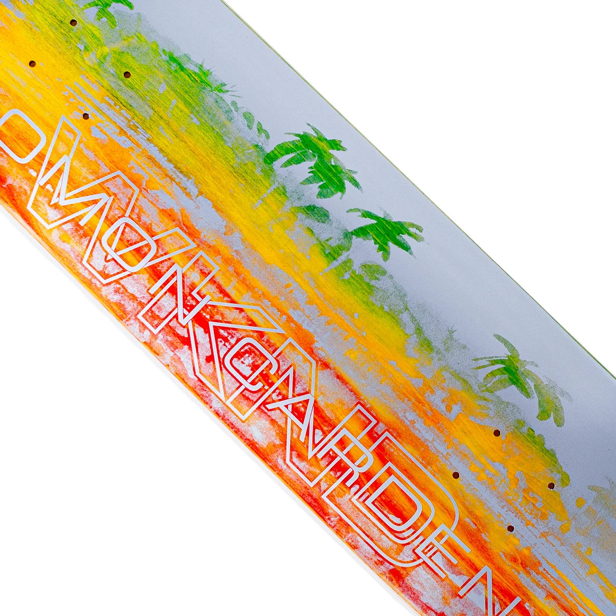 Close-up of a skateboard deck showing a tropical beach scene graphic with palm trees and the brand name 'wknd' in stylized outlined lettering, on a white background.
