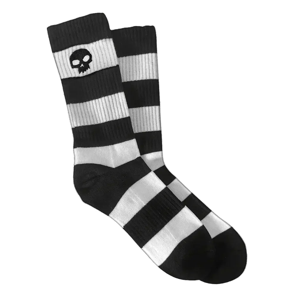 Black and white striped socks with a skull design on a white background