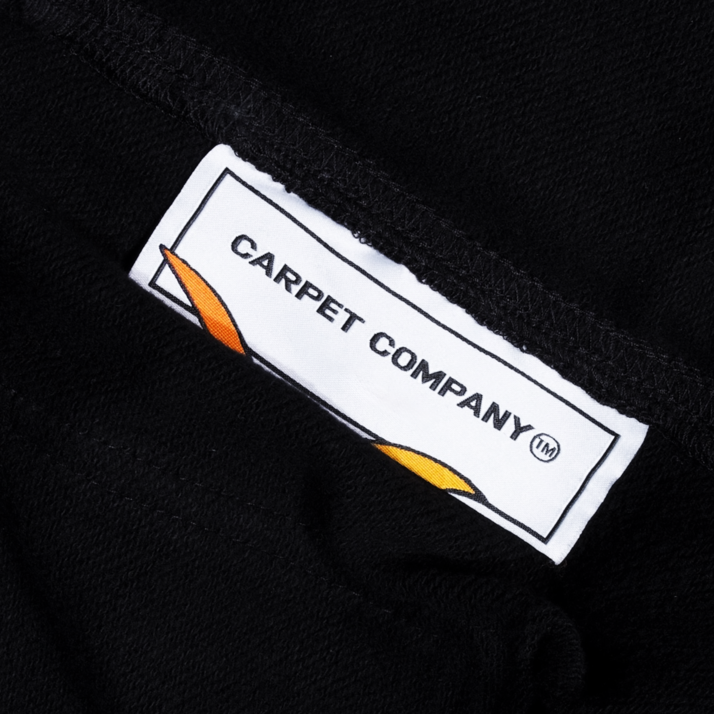 Sudadera negra con capucha y cremallera de Carpet Company