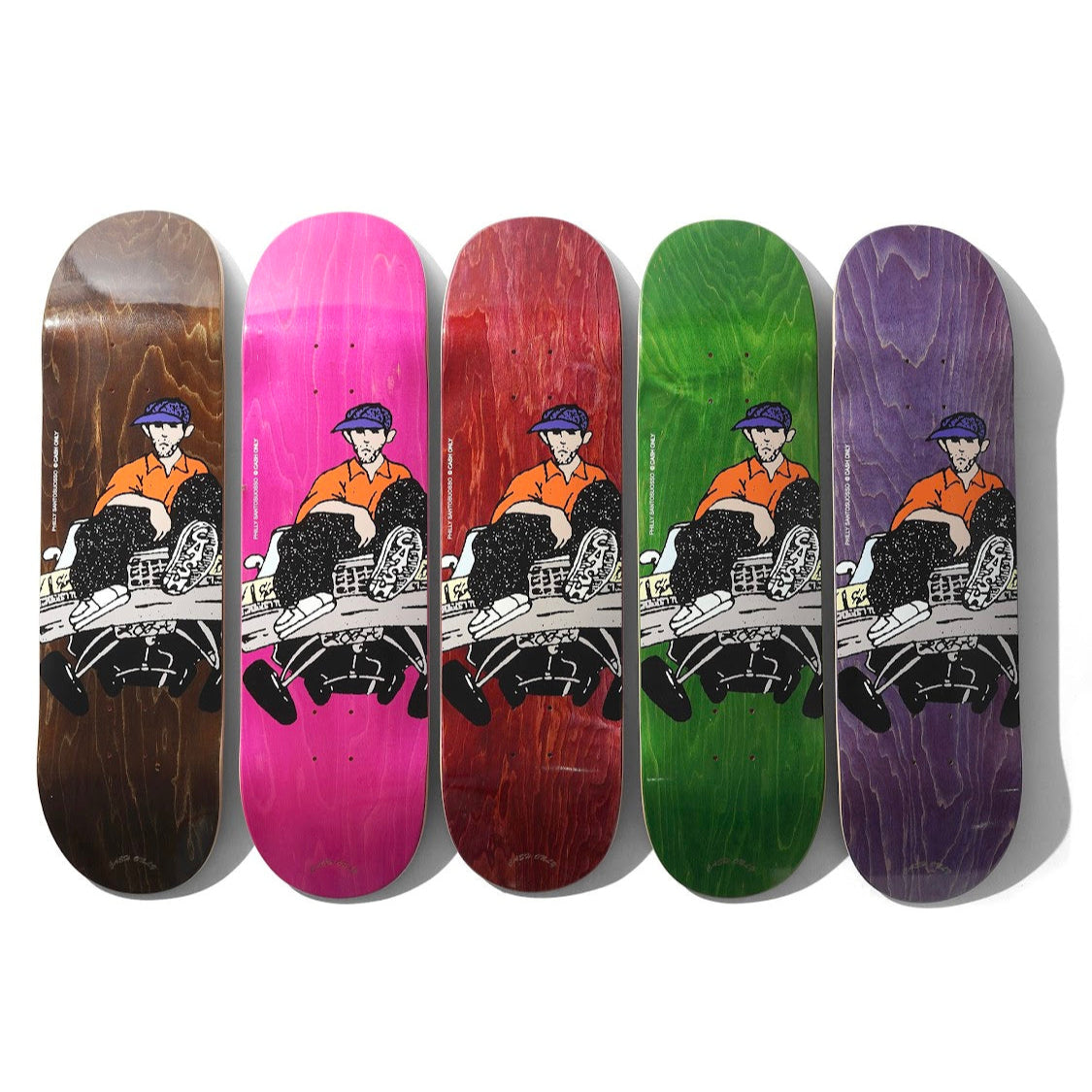 Five skateboard decks with different colored finishes and graphics on a white background