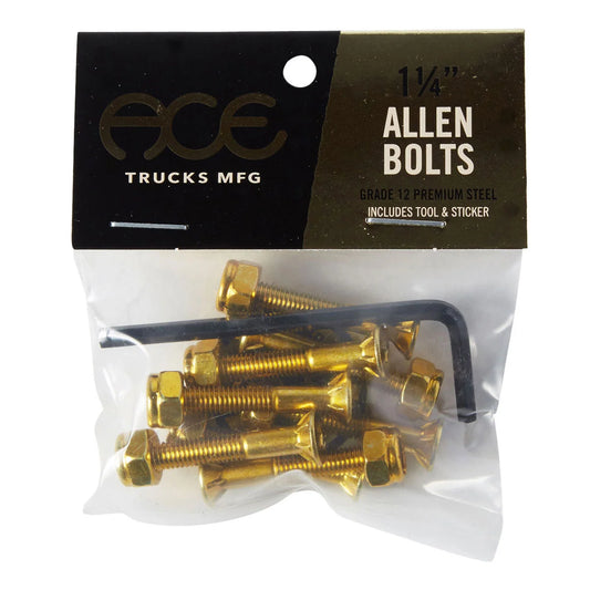 A clear plastic bag containing several brass-colored Allen bolts and a black hex wrench, with a black and brown header card labeled 'ACE TRUCKS MFG' and '1 1/4" ALLEN BOLTS'.