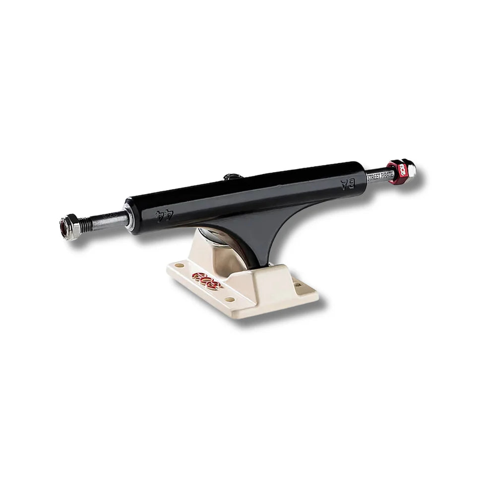 Black and beige skateboard truck on a white background