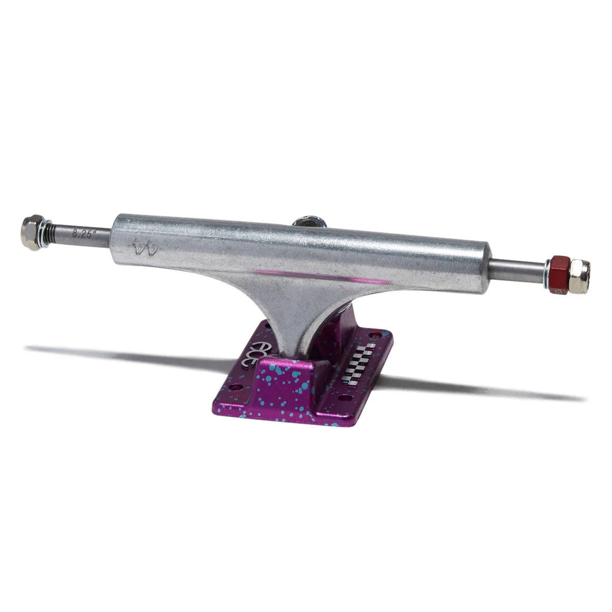 A single skateboard truck with a silver metal hardware body, a purple glitter deck plate, and red end caps, shown on a clean white background.