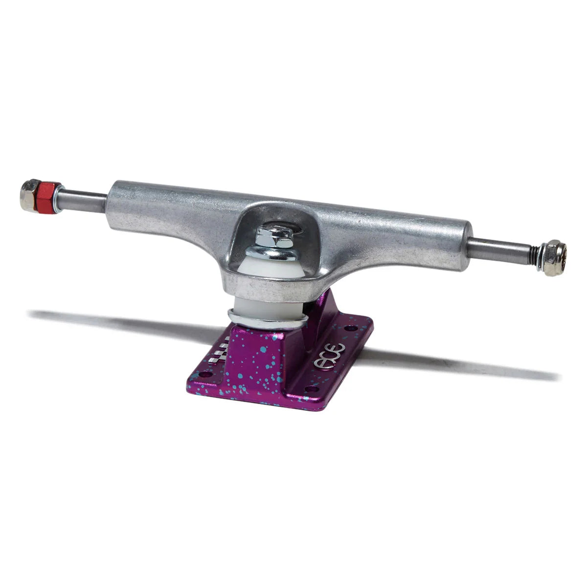 A close-up studio shot of a skateboard truck featuring a metallic silver chrome hardware assembly and a vibrant purple anodized base plate with blue and white speckles.