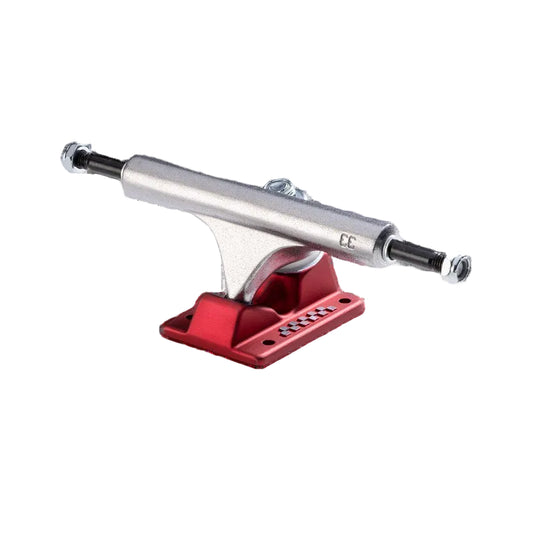 Skateboard truck with red baseplate and silver metal components on a white background
