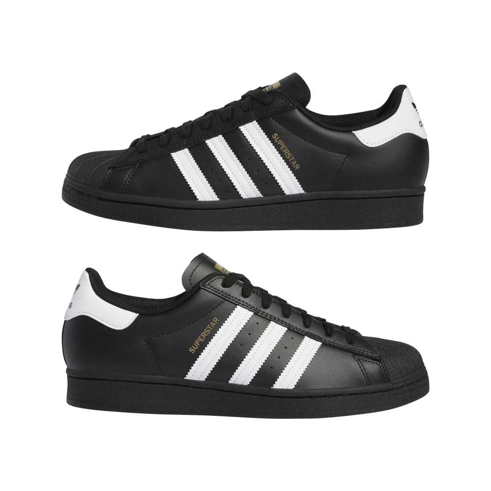 Black Adidas Superstar sneakers with white stripes on a white background