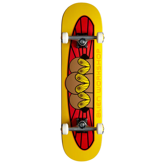 A skateboard shown from the underside, featuring a bright yellow deck with a red and brown graphic design in the center and the words 'ALIEN WORKSHOP' printed vertically in yellow.