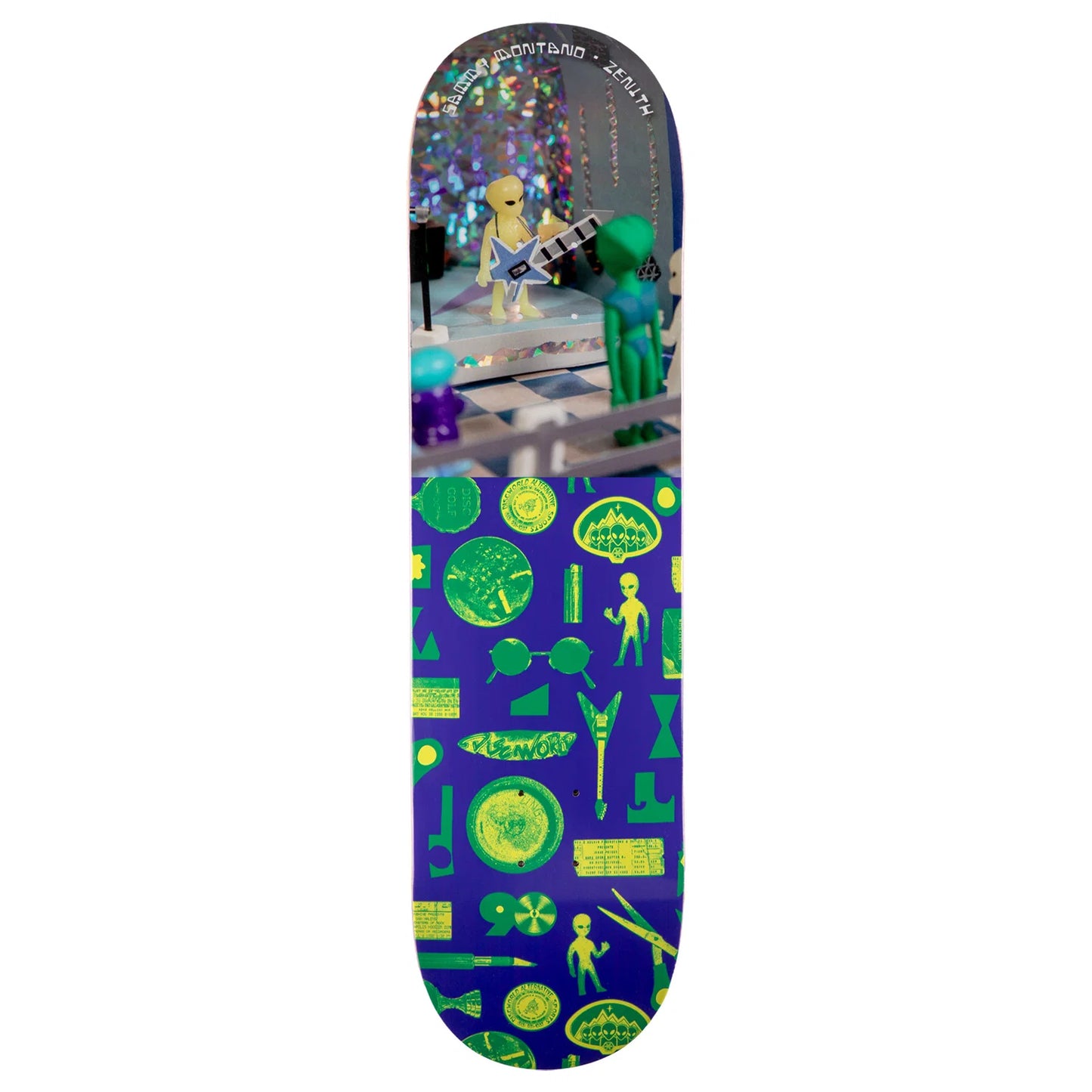 A skateboard deck featuring a colorful graphic design with green alien-like figures and circular icons on a purple background, with a printed scene at the top showing a character holding a guitar.