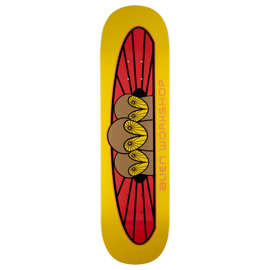 A skateboard deck with a bright yellow background and a central graphic featuring a red sunburst, brown circles, yellow flower-like shapes, and vertical 'BEN WORKSHOP' text.