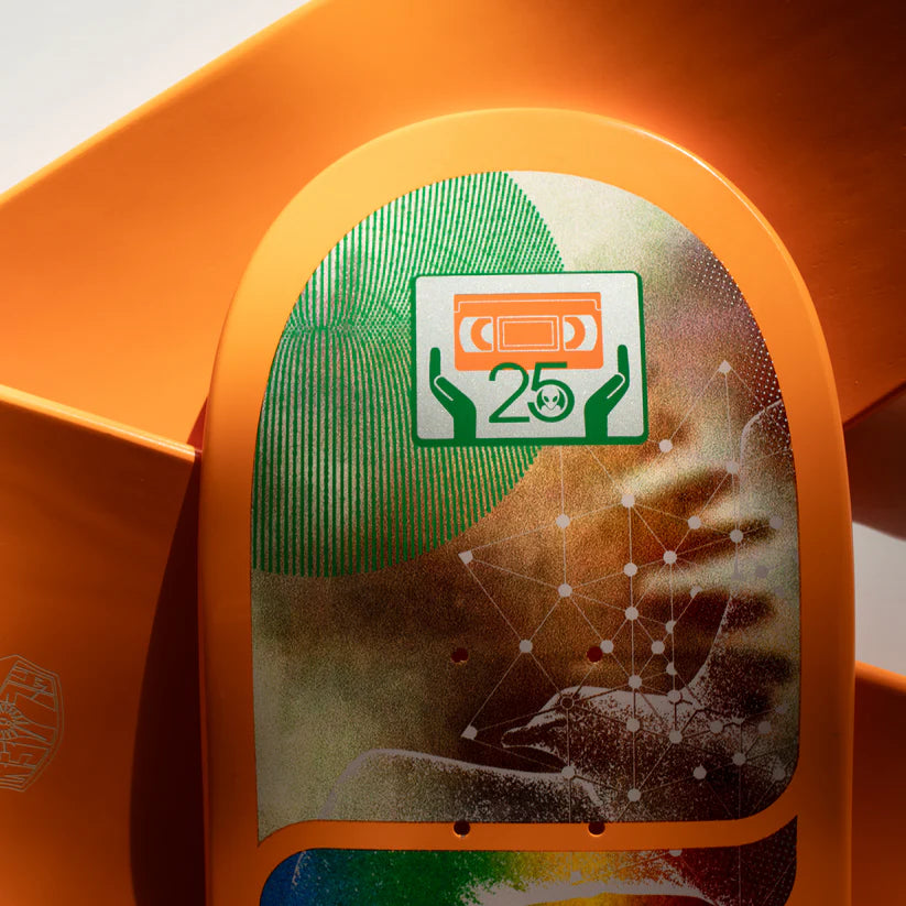 Close-up of a product with a green label featuring a graphic design on an orange background.