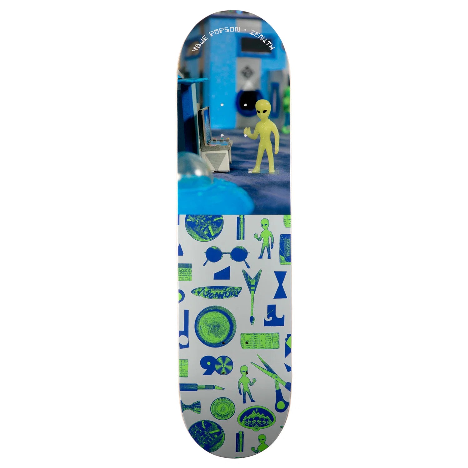 A skateboard deck featuring a two-tone graphic design. The top half shows a blue and black sci-fi laboratory scene with a yellow alien, and the bottom half displays a white background patterned with blue and green alien-themed icons and illustrations.
