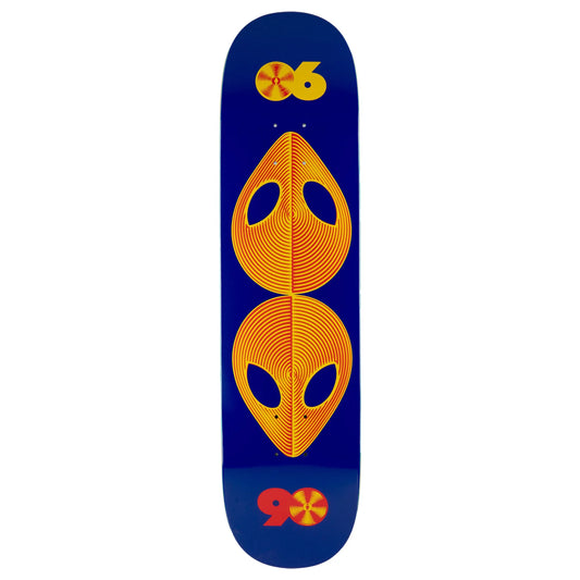 A skateboard deck with a deep blue background featuring a large orange alien head graphic in the center