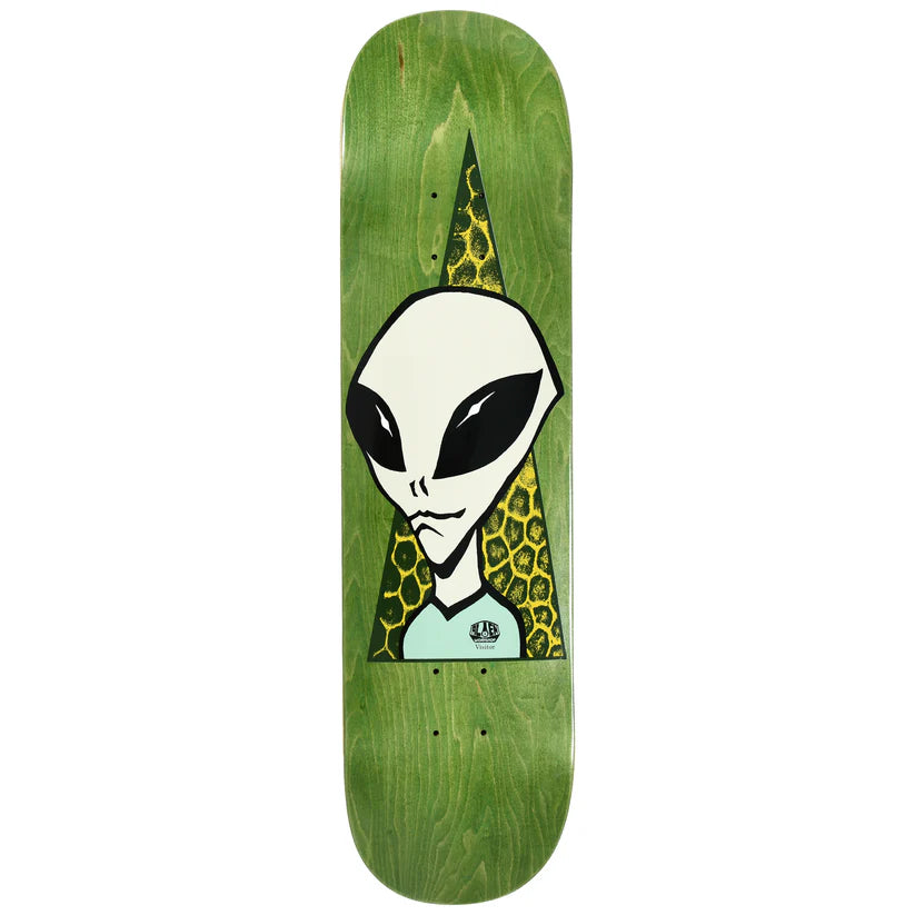 Skateboard deck with alien design on a green background