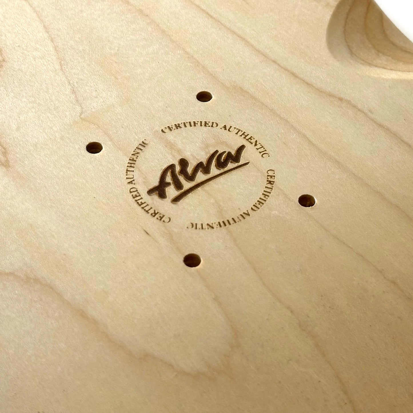 Wooden surface with a certified authentic logo and text.