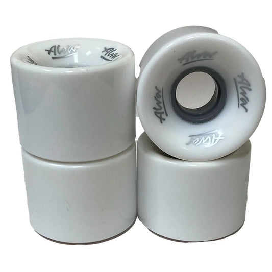 Four white skateboard wheels with black centers on a white background