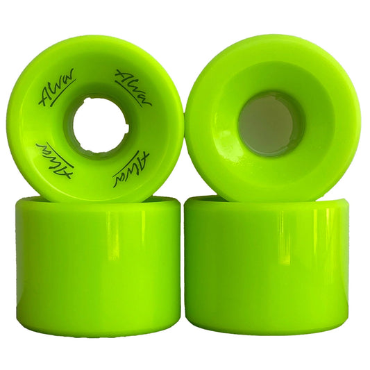 Four green skateboard wheels with visible branding on a white background