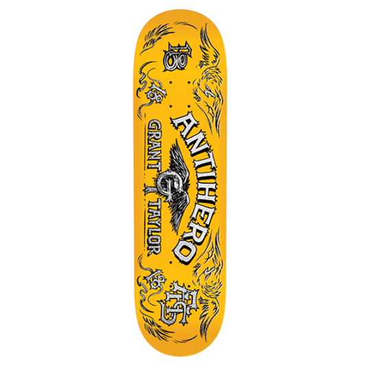 Yellow skateboard deck with black and white graphics on a white background