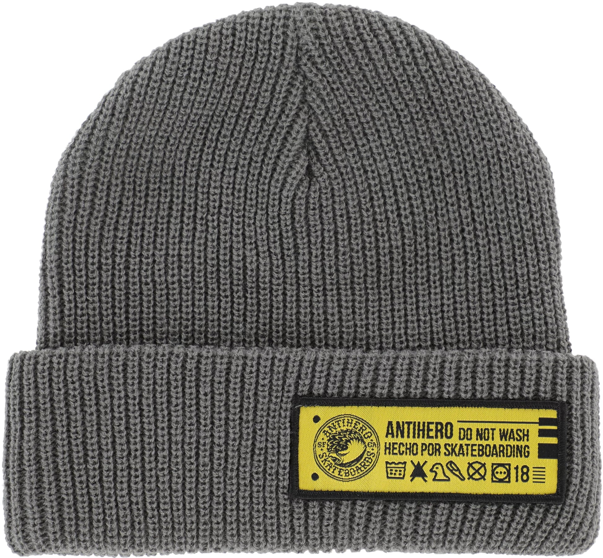 Gray knit beanie with a yellow label on a white background