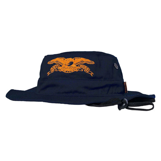 A navy blue boonie hat featuring an orange embroidered eagle graphic on the front, with a black chin strap and a small metal button on the side, shown against a plain white background.