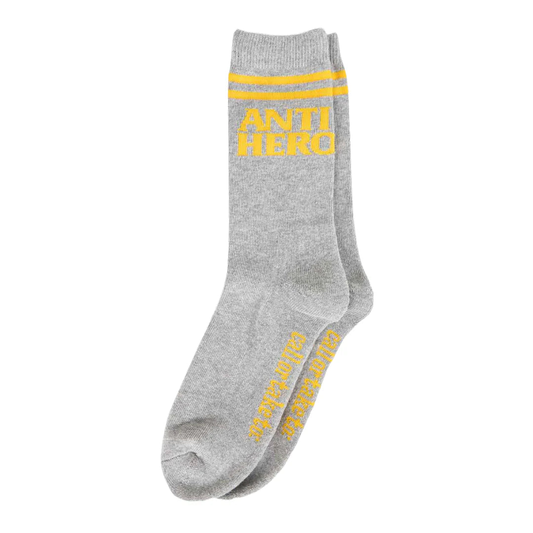 Gray sock with yellow 'Anti Hero' text on a white background
