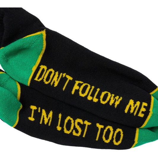 Black socks with green accents and yellow text 'Don't follow me, I'm lost too' on a white background