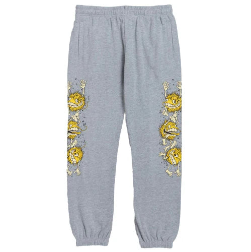 Gray sweatpants with embroidered designs on a white background