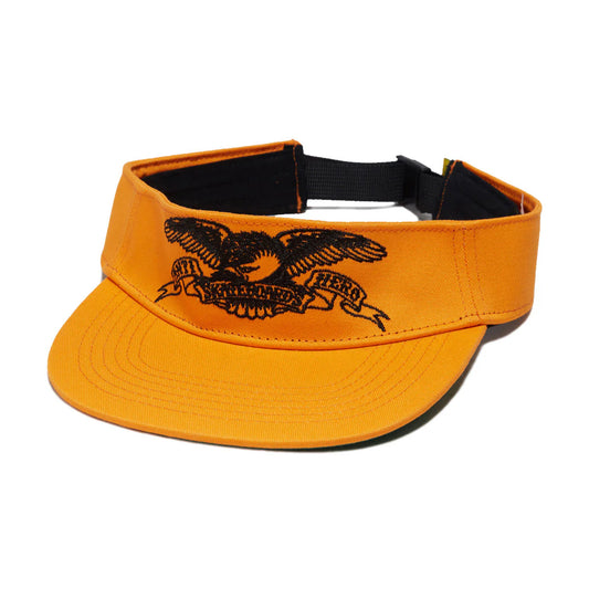 Orange visor with black eagle emblem on a white background