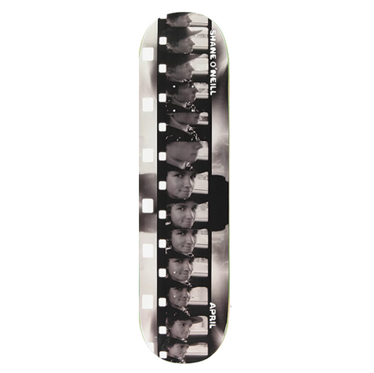 Skateboard deck with a black and white pattern on a white background