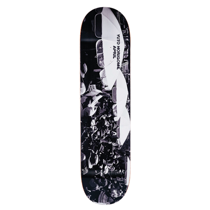 Skateboard deck with black and white design on a white background