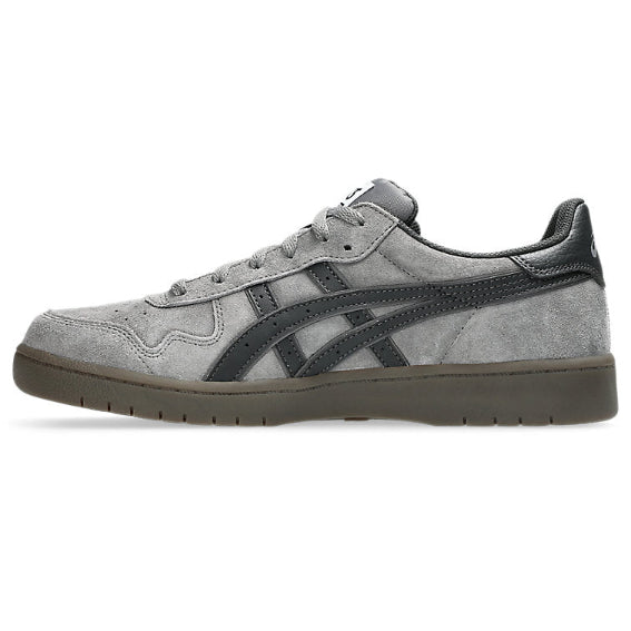 Gray sneaker with black accents on a white background