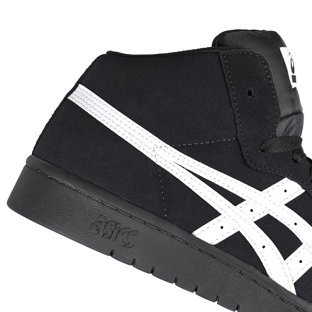 Black and white sneaker with visible brand logo on a white background