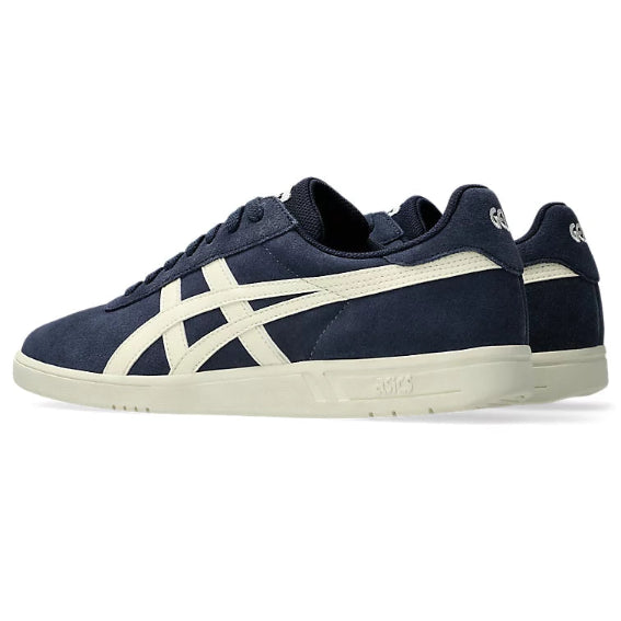 Navy blue sneaker with white accents on a white background