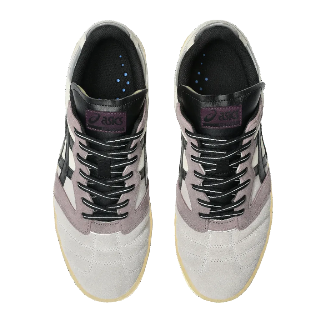 Pair of gray and white sneakers with black accents on a white background