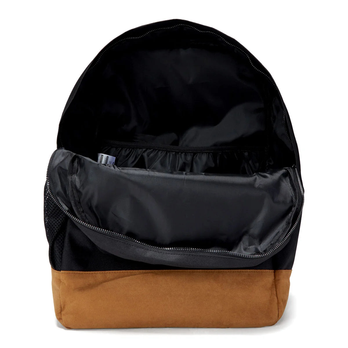 The interior of a backpack with a black nylon lining and a tan suede-like bottom base, shown open against a white background.