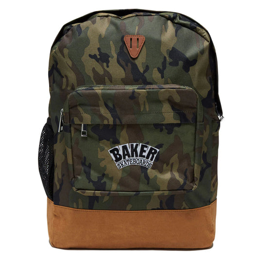 A camouflage backpack with a brown suede-like bottom panel and a brown leather patch on the front. The front pocket features a white and black 'BAKER SKATEBOARDS' patch.