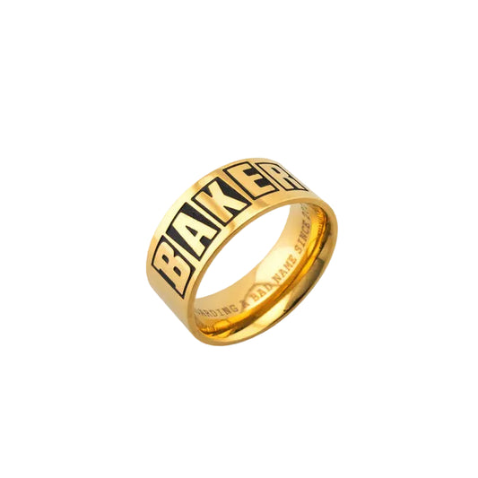Gold ring with 'Baker' engraving on a white background