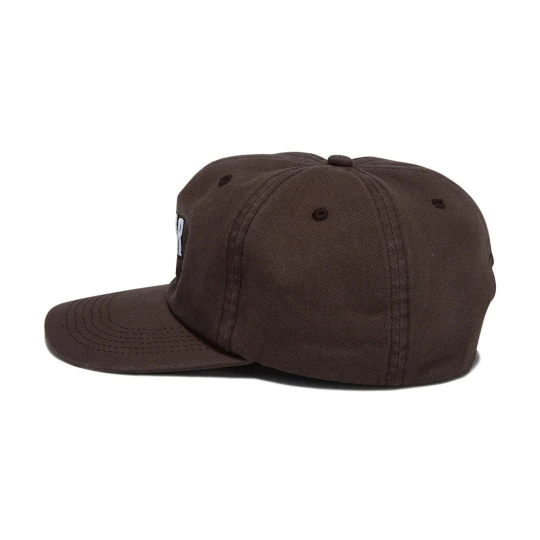 Two baseball caps, one blue and one gray, on a light gray background.