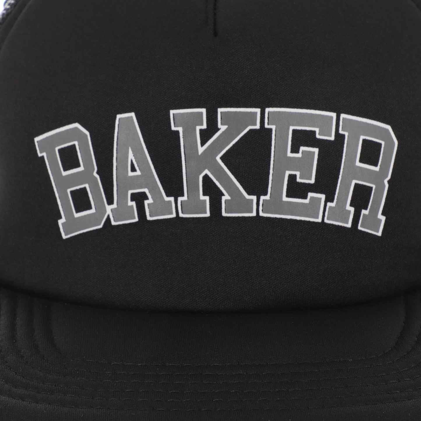 Black cap with 'BAKER' embroidered on the front