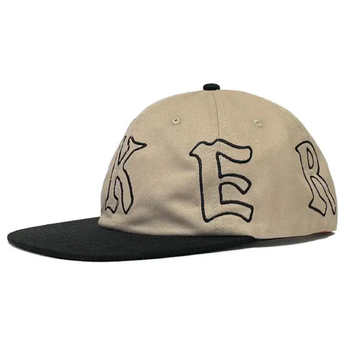 Beige cap with black logo on a white background