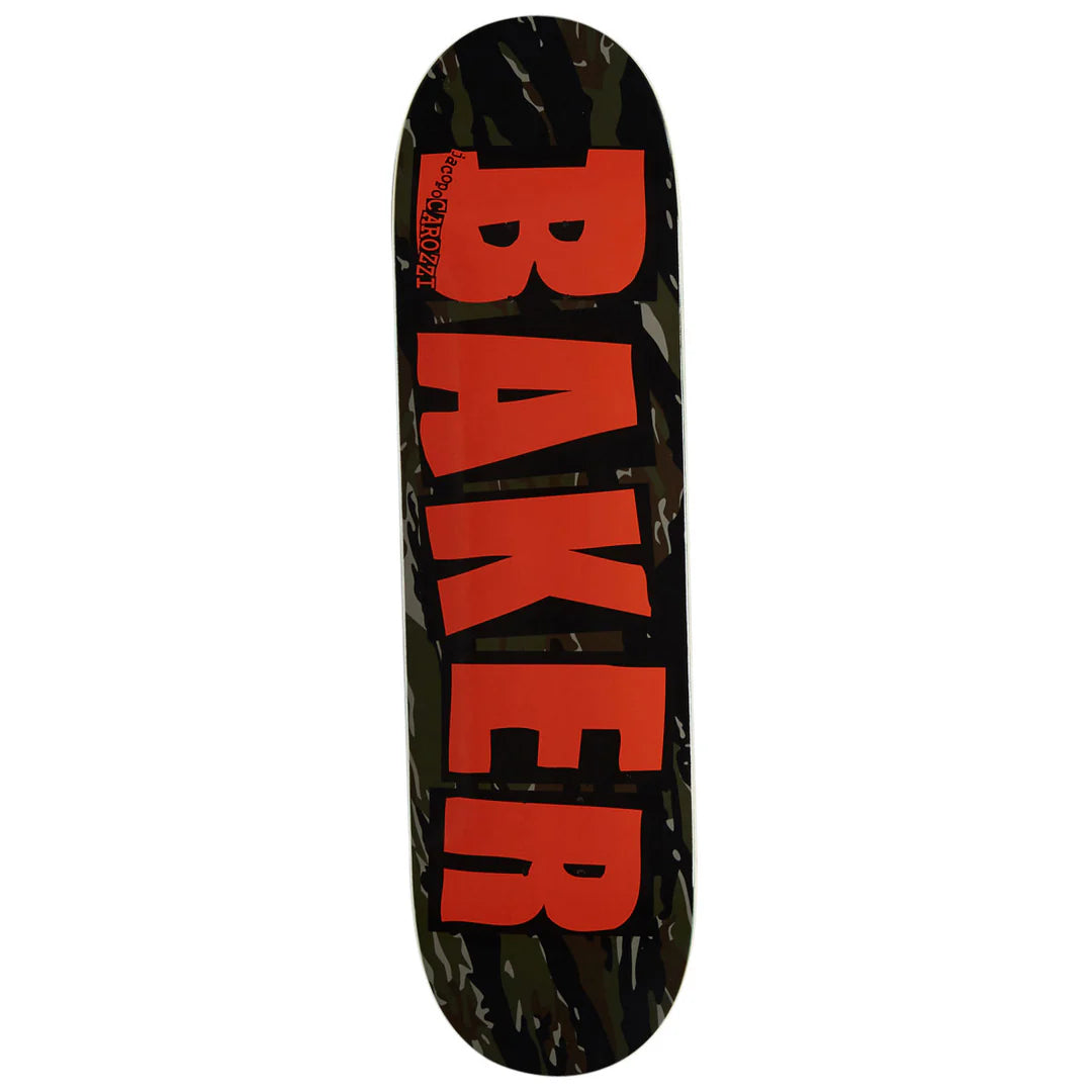 A skateboard deck shown vertically against a plain white background, featuring a dark camouflage pattern with the word 'BAKER' printed vertically in large red letters.
