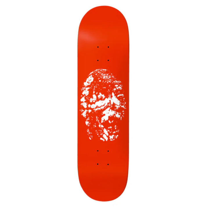 Red skateboard deck with a white graphic design on a white background