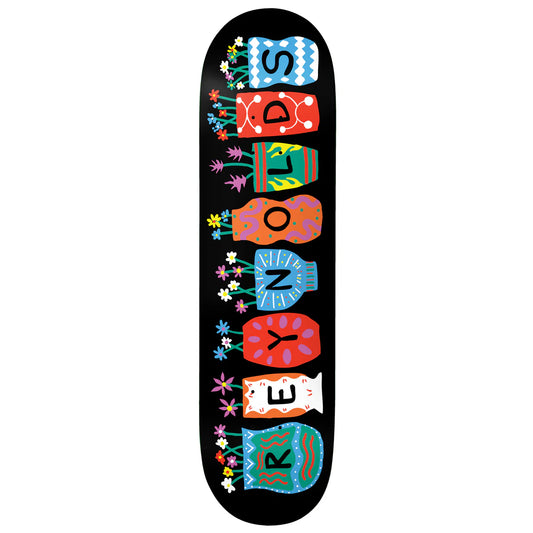 Skateboard deck with colorful text and graphics on a black background