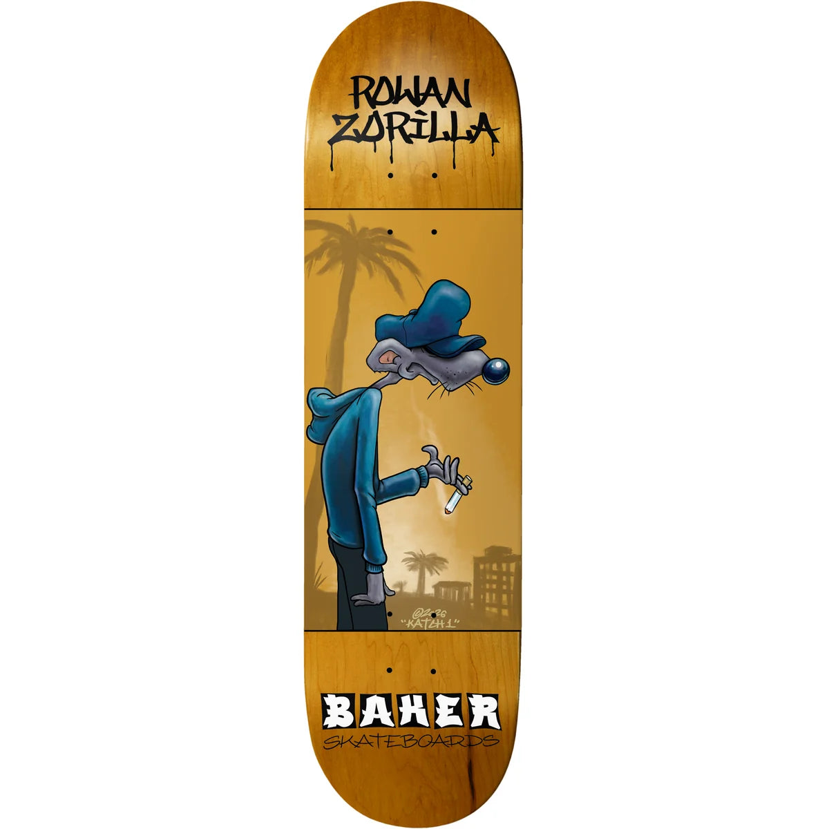 A skateboard deck with a wood-grain brown background, featuring a cartoon illustration of a man in a blue cap and jacket on the side, with 'ROWAN ZORILLA' at the top and 'BAKER SKATEBOARDS' at the bottom.