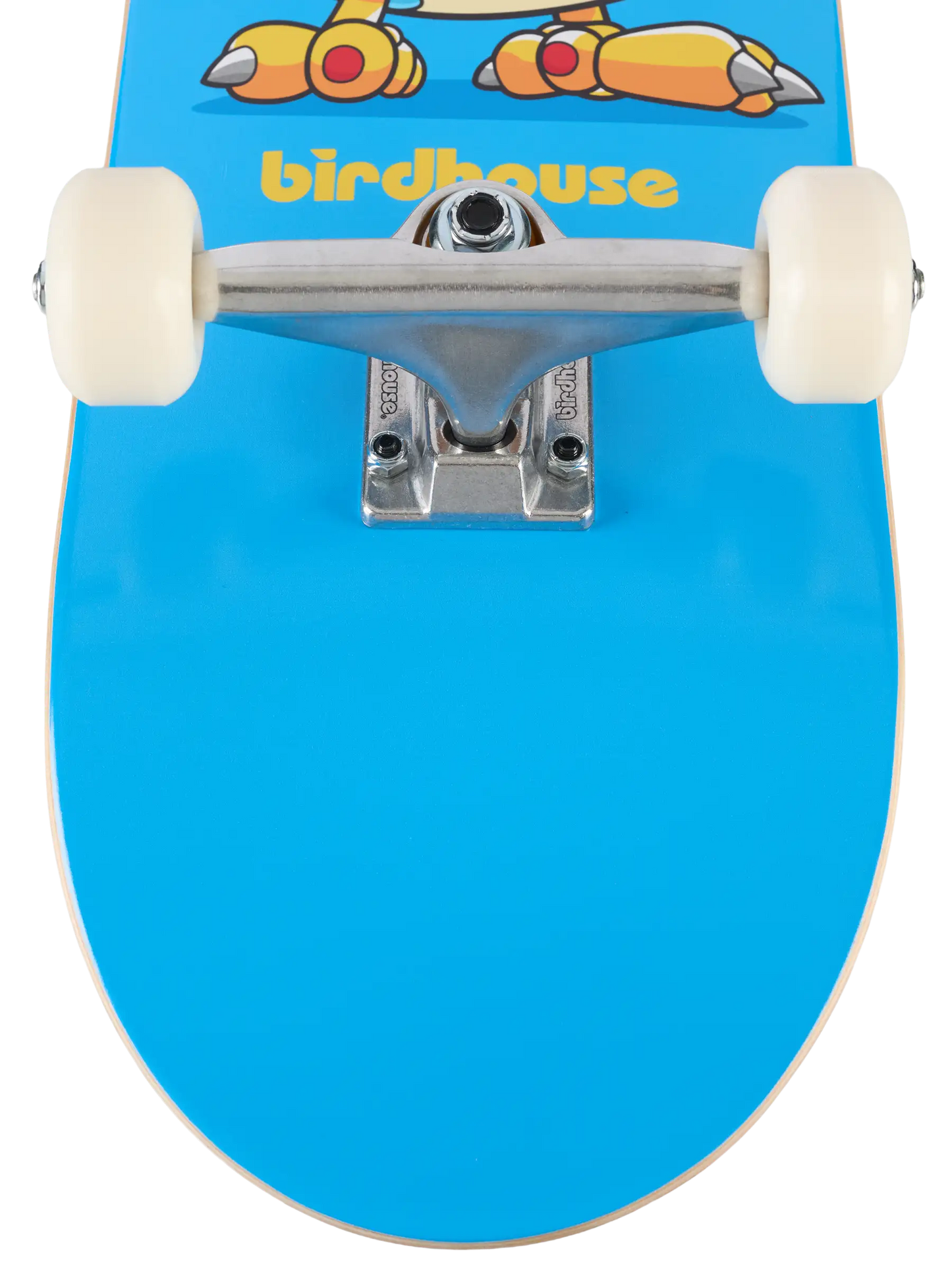 Close-up of a skateboard deck with a bright blue finish, featuring a cartoon graphic and the 'birdhouse' brand name in yellow near the trucks and wheels.