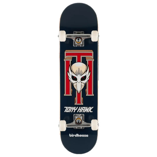 A Tony Hawk skateboard deck featuring a dark navy blue background with a large red and white graphic of a skull inside a stylized 'T' logo, with 'TONY HAWK' and 'birdhouse' printed in white.
