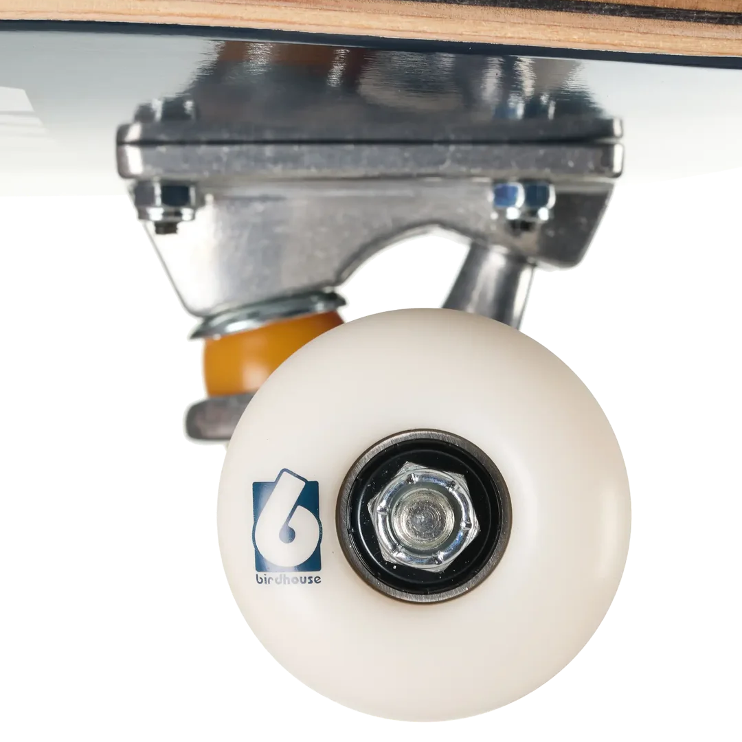 Close-up of a skateboard wheel and truck assembly on a white background, showing a cream-colored wheel with a blue and white '6 burlebone' logo, a silver metal bearing, and part of the wooden deck.