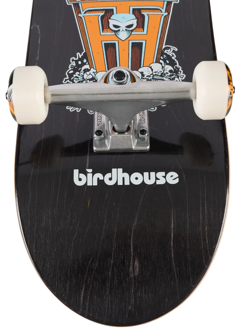 Close-up of a skateboard deck underside with white wheels and silver trucks, showing the Birdhouse logo and a large orange and gray graphic on a black deck.