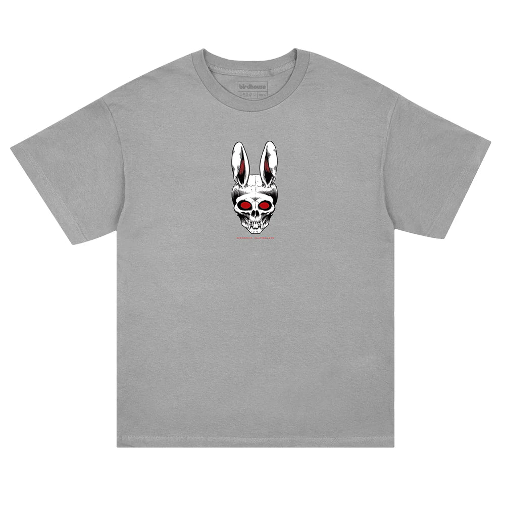 A light gray crewneck t-shirt featuring a graphic of a rabbit skull with red glowing eyes on the center chest.