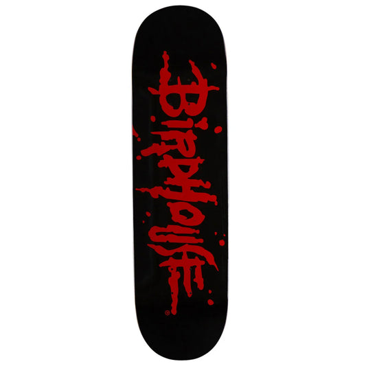 A skateboard deck with a black background and a bold red stylized graphic printed vertically down the center.