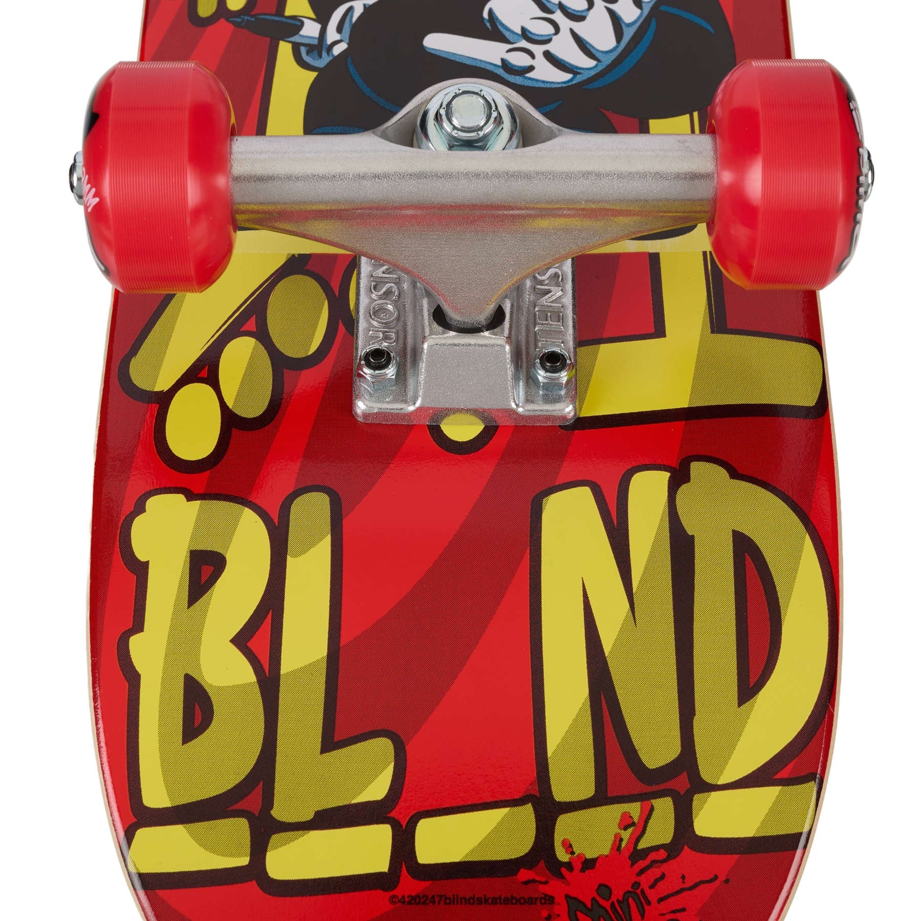 Red skateboard deck with yellow text and red wheels on a white background